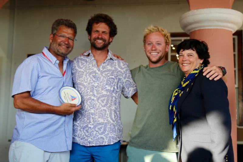 Setting a Multihull record for the race, the crew of Allegra receive their award from RBYC Commodore, Leatrice Oatley photo copyright Tom Clarke taken at Royal Bermuda Yacht Club