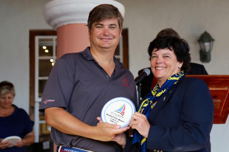 Stephen Murray Jr., Skipper of Volvo 70, Warrior from the Warrior Sailing Program operated by the US Merchant Marine Academy Foundation, with RBYC Commodore, Leatrice Oatley photo copyright Tom Clarke taken at Royal Bermuda Yacht Club