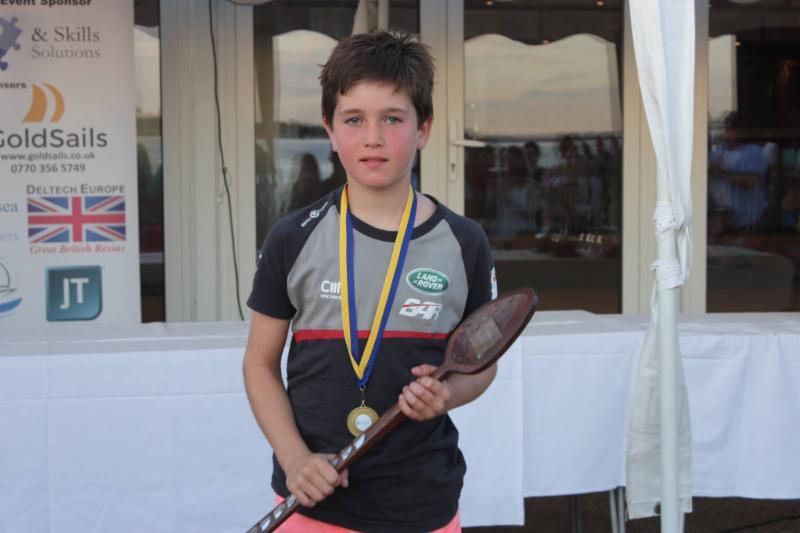 Toby Pearson with the Pyefleet Stir Trophy for the most improved helm at Learning & Skills Solutions Pyefleet Week photo copyright Mandy Bines taken at Brightlingsea Sailing Club