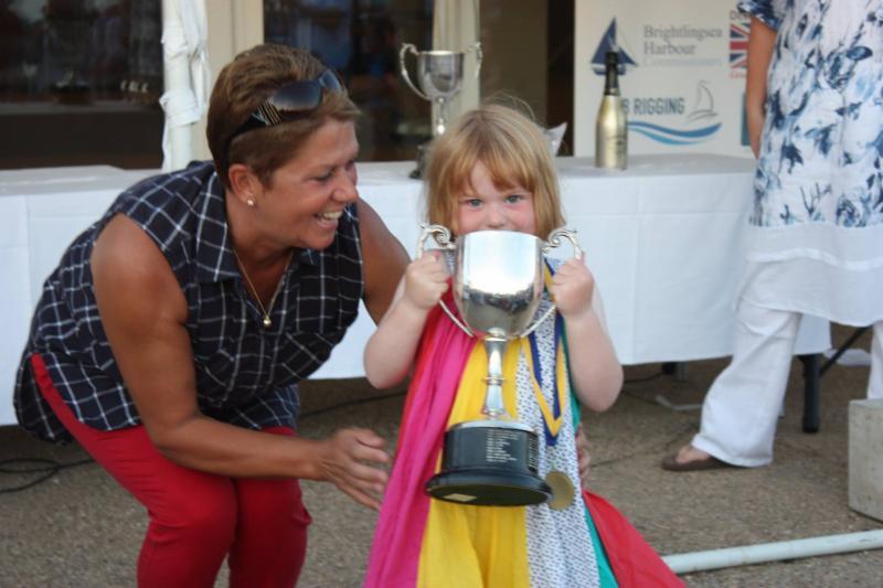 Sue Bouckley of Learning & Skills Solutions presents three year old Josie Heppell with her Youngest Crew trophy at Learning & Skills Solutions Pyefleet Week - photo © Mandy Bines
