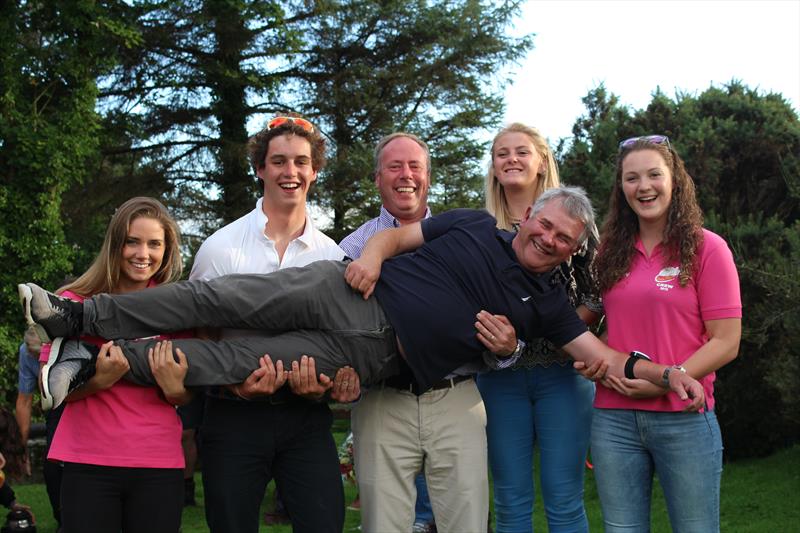 Offshore Cruising winning 'Hunca Munca' crew (l-r) Pip Benson, Fin Macaulay-Smith (skipper), Richard Carson, Zoe Dupuy and Caitlin Ross, hoisting Willie Patterson, the boat's owner at Solway YC Kippford Week photo copyright Beatrice Overend taken at Solway Yacht Club