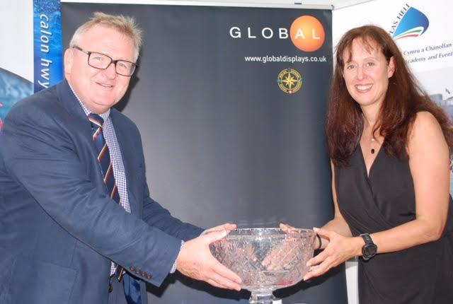 Mojito Co-Skipper Vicky Cox accepting the Global Displays Midland Bowl from ISORA Hon Secretary Stephen Tudor photo copyright Gerallt Williams taken at Pwllheli Sailing Club