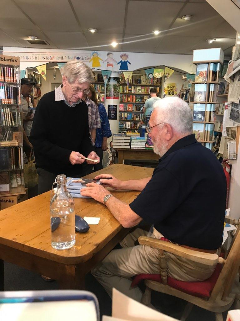 Sir Robin Knox-Johnston signing books at Falmouth Bookseller photo copyright Jeremy Atkins taken at 