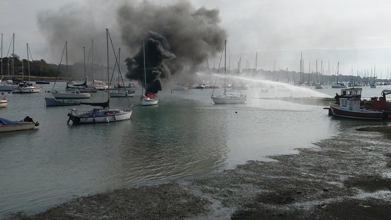 Small yacht caught fire on the Hamble River photo copyright Trevor Pountain taken at 