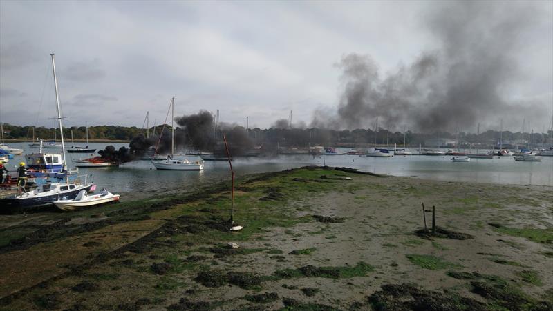 Small yacht caught fire on the Hamble River photo copyright Trevor Pountain taken at 