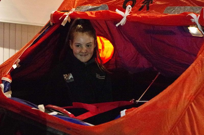 Topper sailor, EABC's Zoe Whitford in the life-raft! - photo © Eddie Cameron