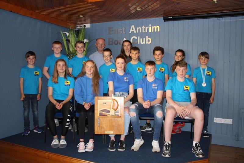 Proud Commodore Steven Kirby and club coach Debbie Hanna (back row) with the victorious East Antrim BC junior and youth squad with the prestigious 'Top Club' trophy won at the recent RYA-NI Youth Championship photo copyright Lucy Whitford taken at East Antrim Boat Club