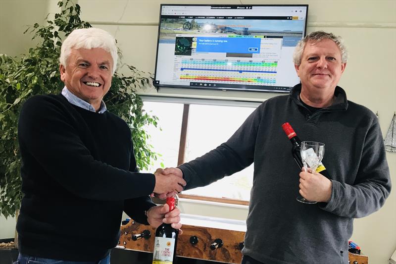 Tony Dalton (right) installs and configures a new weather station at Yorkshire Dales SC photo copyright Philip Whitehead taken at Yorkshire Dales Sailing Club