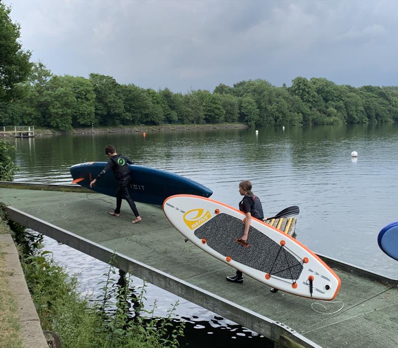 Freddie Sunderland & Stella Nygard paddleboarding at Olton Mere photo copyright Jane Sunderland taken at Olton Mere Sailing Club