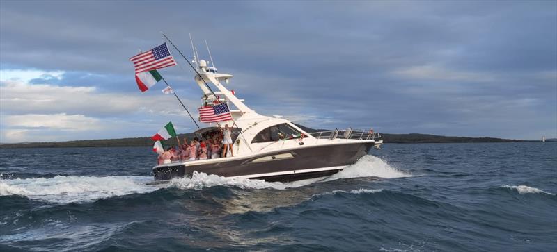 Italian and American unity after the teams work together to save American Magic's AC75 'Patriot' after a huge capsize on day 3 of the PRADA Cup photo copyright Richard Gladwell / Sail-World.com taken at 