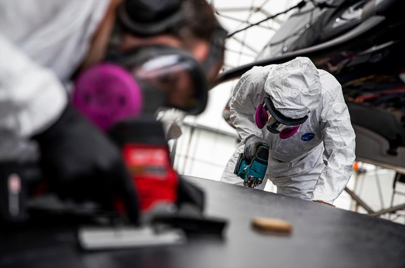 The replacement panel that was fabricated at the Emirates Team New Zealand facility is cut to fit into PATRIOT's port-side hull photo copyright Sailing Energy / American Magic taken at 