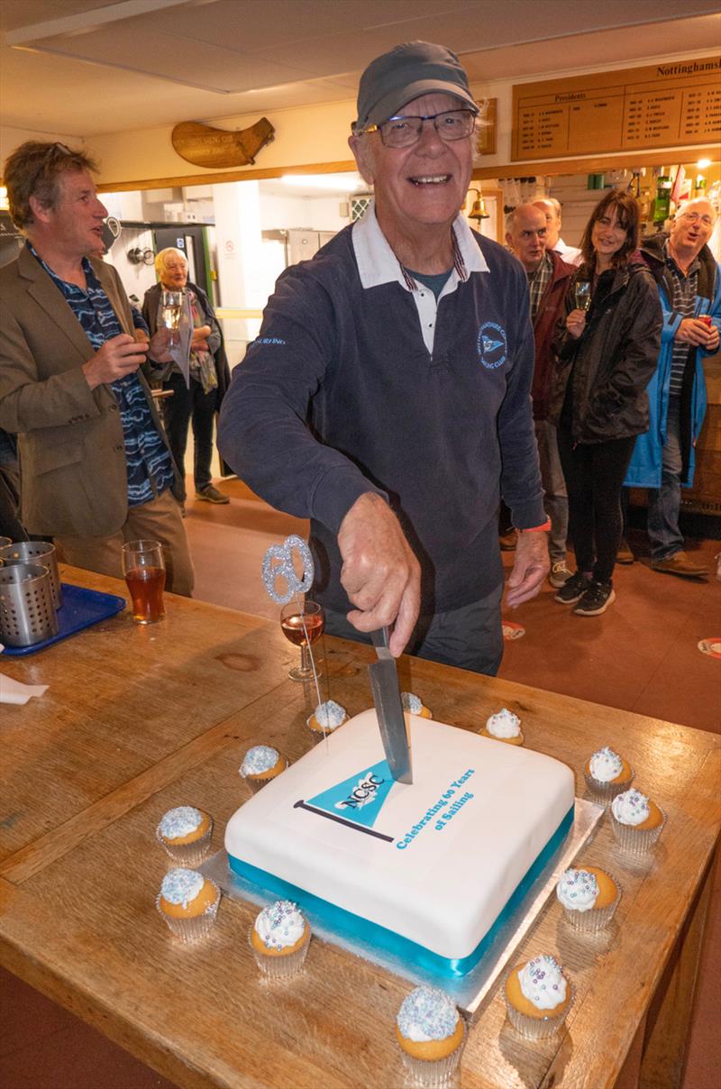 Preseident Russ Towns cutting the cake at Notts County Sailing Club 60th Cenebrations photo copyright David Eberlin taken at Notts County Sailing Club