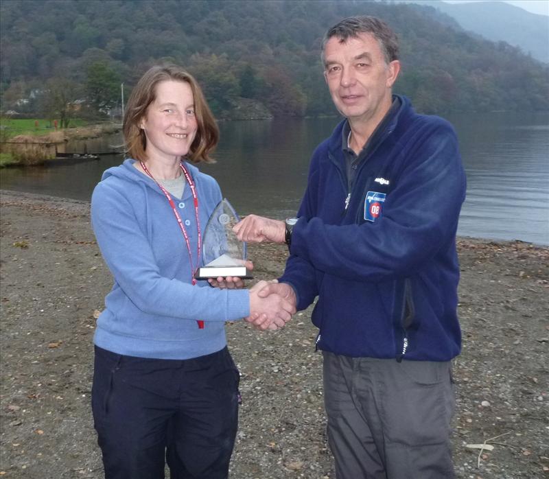 Kathy Jackson of Lakes Leisure receives her trophy from Dave Woodhead photo copyright RYA taken at Glenridding Sailing Centre