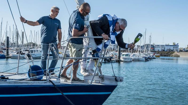 Pierre-Yves Cavant, Lionel Reigner and Lionel Péan, the 1985 Whitbread winner, christen the refitted L'Esprit d'Equipe in Les Sables d'Olonne - photo © Team L’Esprit D’Equipe