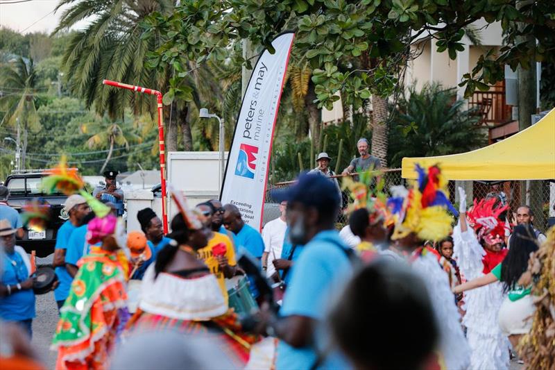 Crew members joined in a cultural procession from Nelson's Dockyard to Antigua Yacht Club ahead of the 54th Antigua Sailing Week Welcome and Peters & May Round Antigua Race Prizegiving - photo © Paul Wyeth / www.pwpictures.com