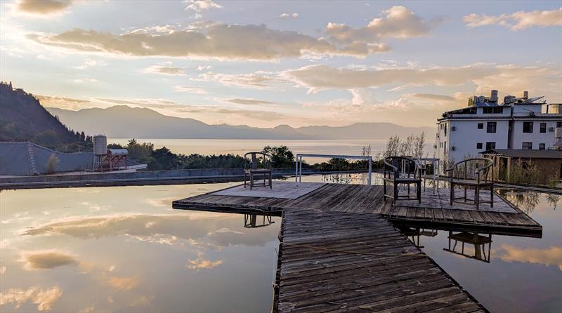 View over the lake on Saturday evening at 2025 Lake Fuxian Regatta photo copyright Mark Jardine taken at 