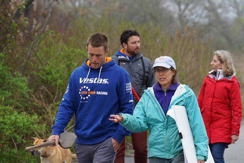 Nick Dana, boat captain of Vestas 11th Hour Racing and Newport local, speaks with Wenley Ferguson, Director of Habitat Restoration at Save The Bay as they walk down Hazard Road to learn about the restoration of the Gooseneck Cove Marsh, Newport, RI photo copyright Damian Foxall / Vestas 11th Hour Racing taken at 