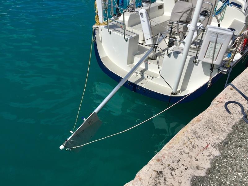 After some trial and error, Bailiwick‘s successful rig included a whisker pole, a bulkhead panel, screwdrivers and Dyneema lashing, and the emergency tiller serving as a pivot point photo copyright Bailiwick / Chris Museler taken at 