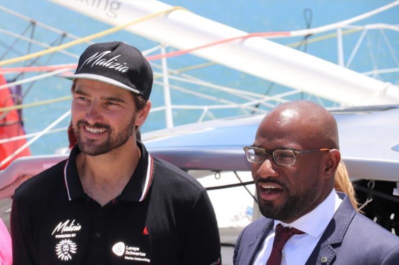 Skipper Boris Herrmann (left) with Bermuda Tourism Authority's Glenn Jones (right) aboard Malizia photo copyright Louay Habib taken at Royal Bermuda Yacht Club