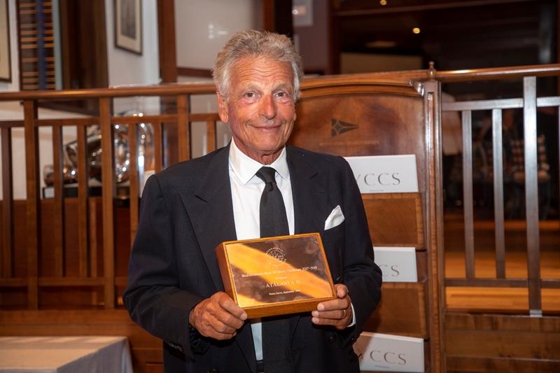 Atalanta II's Carlo Puri Negri accepts his trophy for winning the 2017-18 IMA Mediterranean Maxi Offshore Challenge - photo © Gianfranco Forza