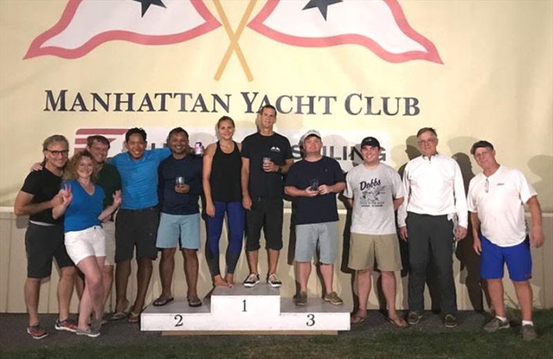 Everyone loves to stand on the winner's podium. (L to R): Steve Rawlings, Tatiana Volkova, Paul Wilson, Alex Mallari, Ed Rambali, Sara Wiss, Michael Barry, Eric Hoyle, Geoff Bernard, Erik van Nispen, and Rick Kern - J/24 Racing at Manhattan Yacht Club photo copyright Manhattan Yacht Club taken at Manhattan Yacht Club