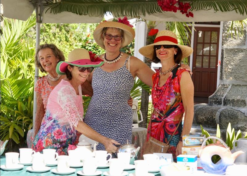 A bevy of volunteers dressed in blooming hats and garden dresses - Antigua Classic Yacht Regatta 2019 - photo © Jan Hein 