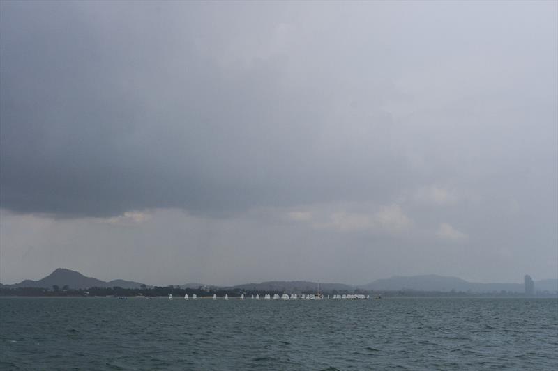 Top of the Gulf Regatta 2019. Rain storm approaching. Optimists get a soaking photo copyright Guy Nowell / Top of the Gulf Regatta taken at Ocean Marina Yacht Club