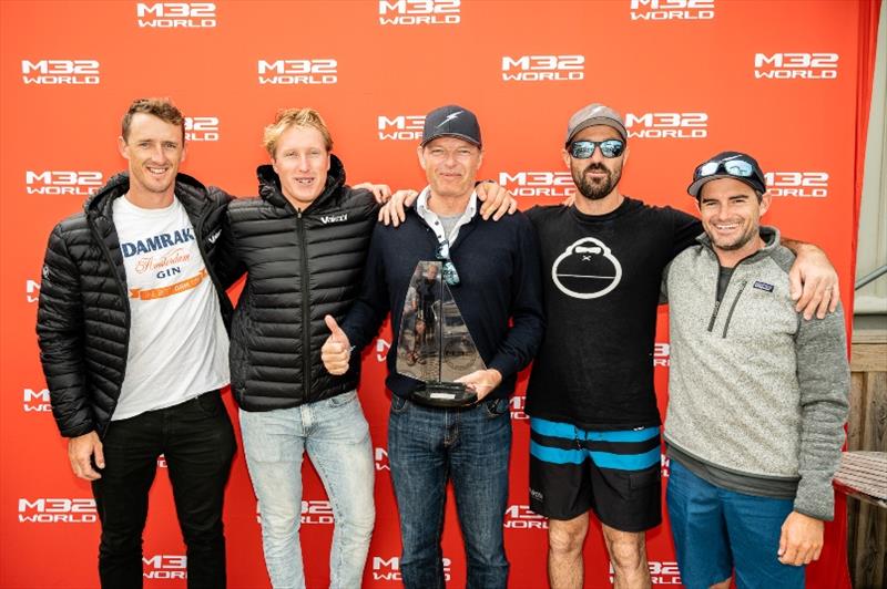 Pieter Taselaar and his winning Bliksem crew pick up their silverware. - M32 European Series Marstrand 2019 photo copyright Drew Malcolm / M32 World taken at 