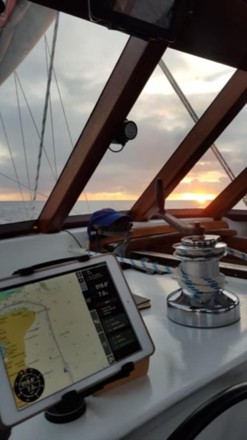 Last morning sunrise off the Piha Channel, Tongatapu - photo © Island Cruising NZ