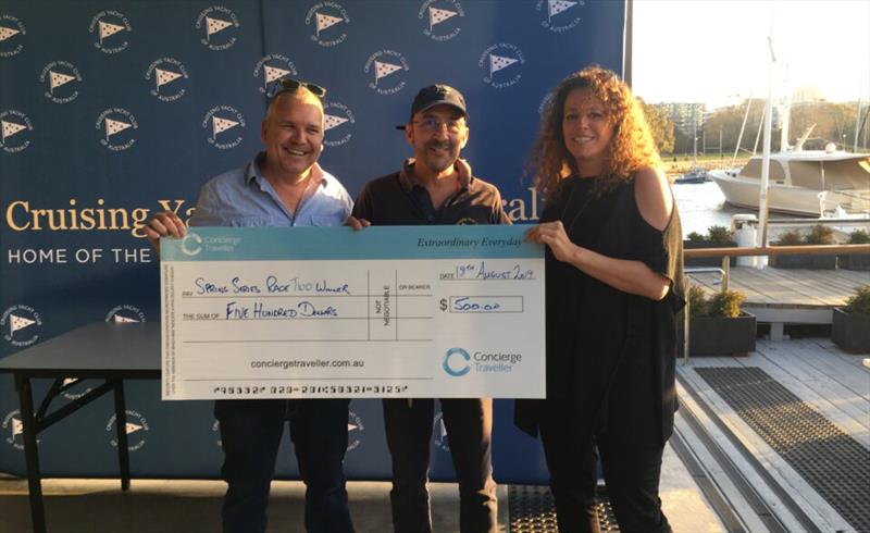 Jamie Strickland (L), Managing Director Concierge Traveller, and Nicola Billens (R), Marketing Manager Concierge Traveller, presenting Rogerio Blanc-Ramos, skipper of Applejack, the Concierge Traveller voucher and first place in Div 3 of Race 2 photo copyright Cruising Yacht Club of Australia taken at Cruising Yacht Club of Australia