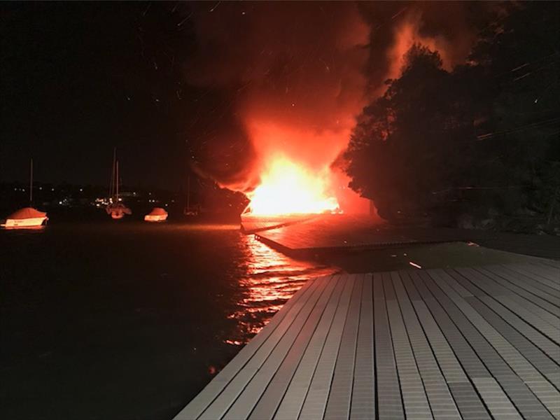 A fire at Lane Cove 12ft Sailing Skiff Club last year that destroyed about 40 boats photo copyright Harry Fisher taken at Lane Cove 12ft Sailing Skiff Club