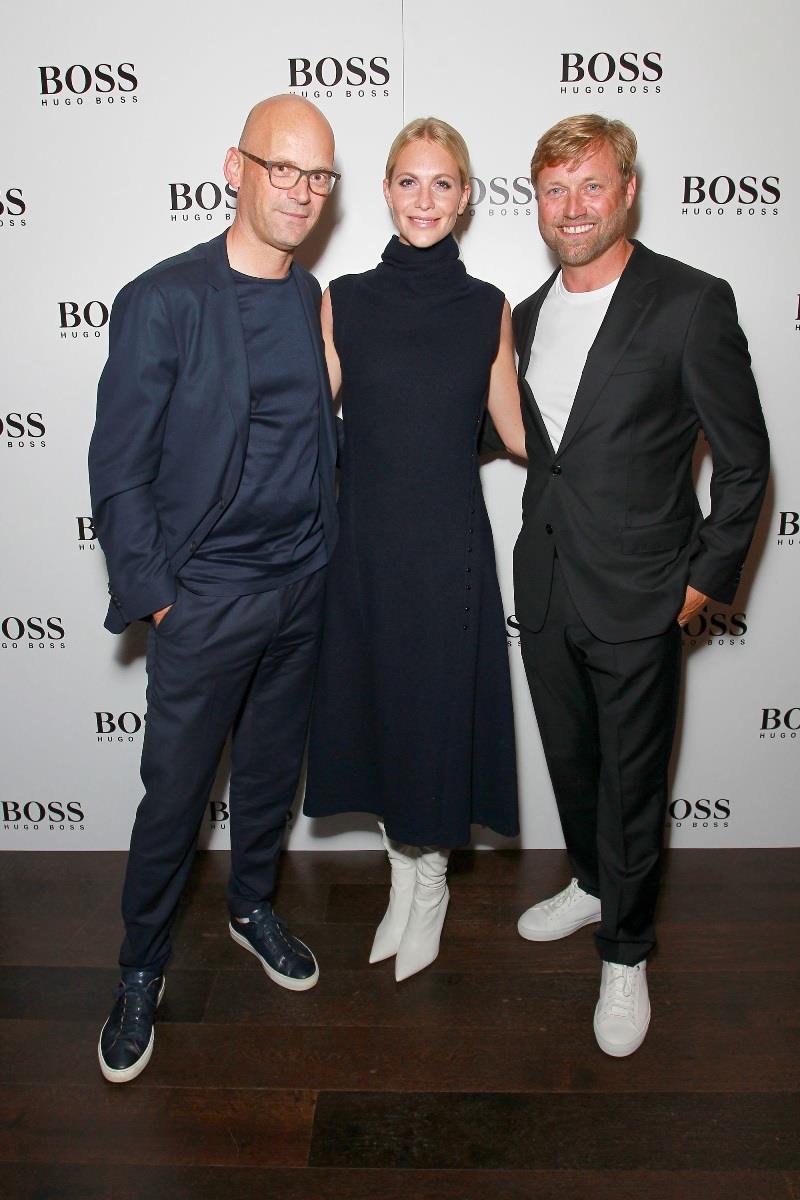 (L-R) Mr Langer, Poppy Delevingne and Alex Thomson attend the The 'HUGO BOSS' Boat Christening Ceremony and Cocktail Party on September 19, in London, England photo copyright David M. Benett / Getty Images / Hugo Boss taken at 