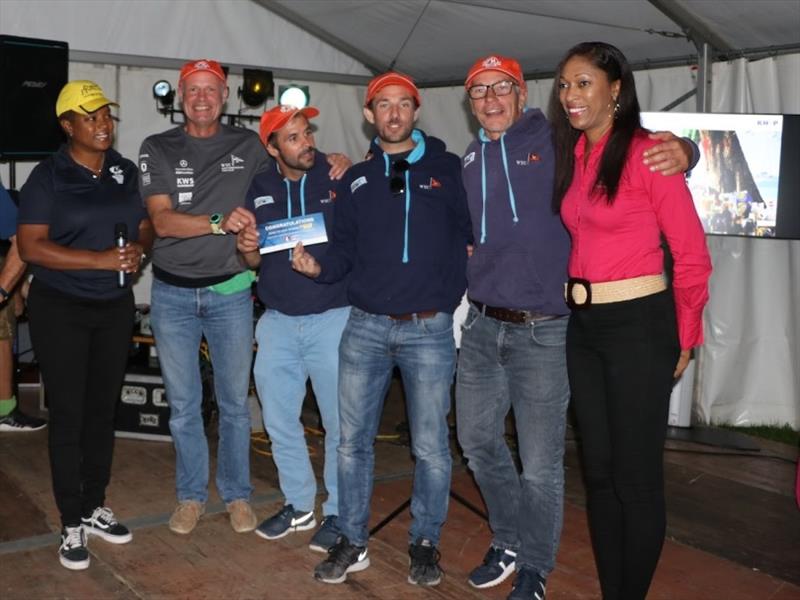 (L- R) Rana Lewis, Antigua Sailing Week; Team Mothership with skipper Max Rieger (3rd from left); Cherrie Osborne, The Antigua and Barbuda Tourism Authority photo copyright Antigua Sailing Week taken at Royal Southern Yacht Club