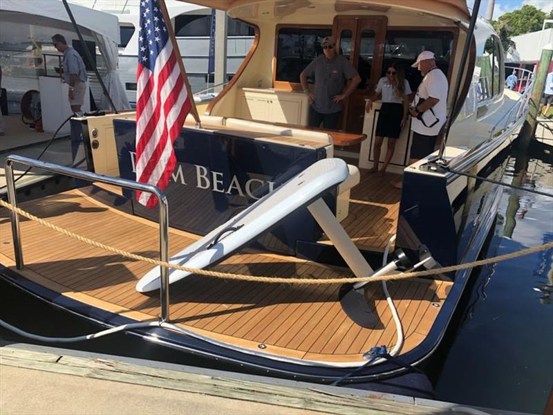 A Fliteboard being presented on the back of a Palm Beach Yacht - photo © AIMEX