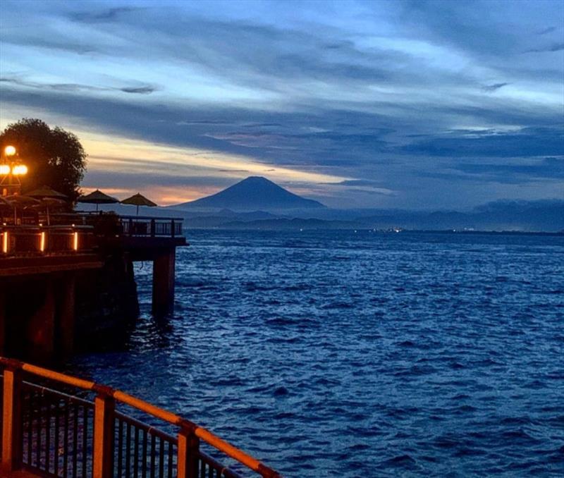 Mount Fuji rises in the distance. In the foreground is the 2020 Summer Olympics sailing venue in Enoshima, Japan. - photo © Perfect Vision Sailing