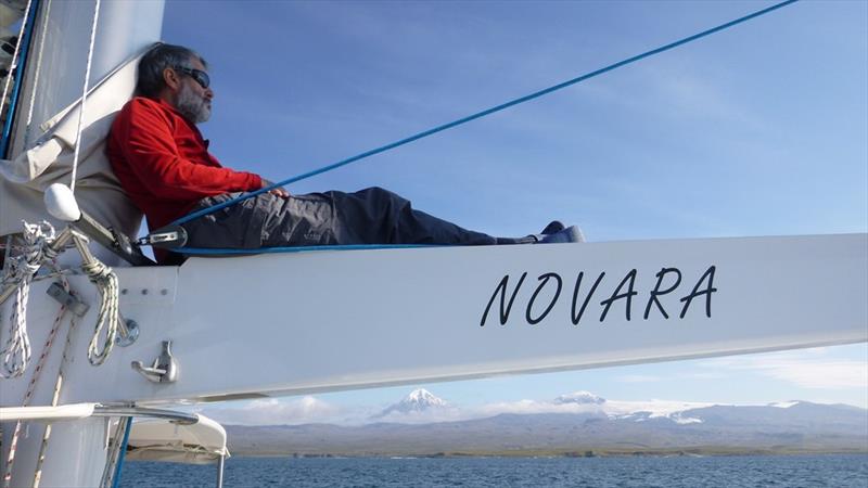 Steve Brown s/v Novara - Relaxing on the boom - photo © Dr. Guido Marx