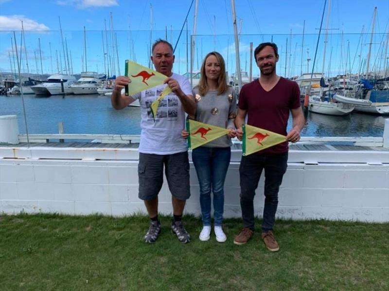 Tasmania’s first Sharpie woman champion Kirsty Salter (centre) with her crew, her husband Julian Salter (right) and his uncle Stephen Salter (left) photo copyright Oli Burnell taken at Royal Yacht Club of Tasmania