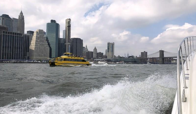 East River, NYC, Brooklyn Bridge photo copyright Riviera taken at 