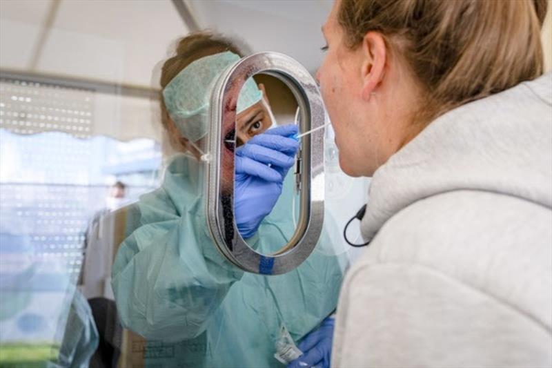 Professor Maneesh Singh (England) conducts the saliva test photo copyright Sascha Klahn taken at 