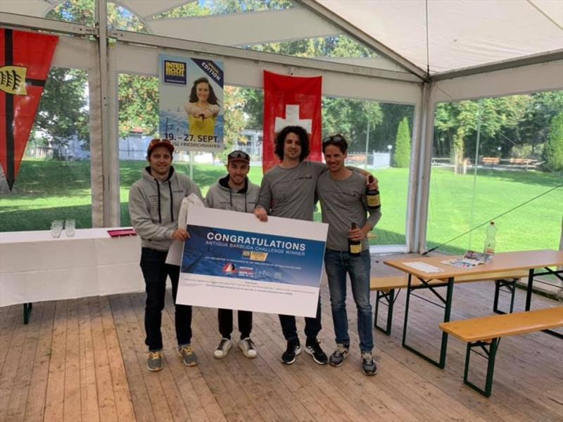 Swiss team displays their voucher during afternoons prizes at the Württembergischer Yacht Club - photo © Antigua Sailing Week