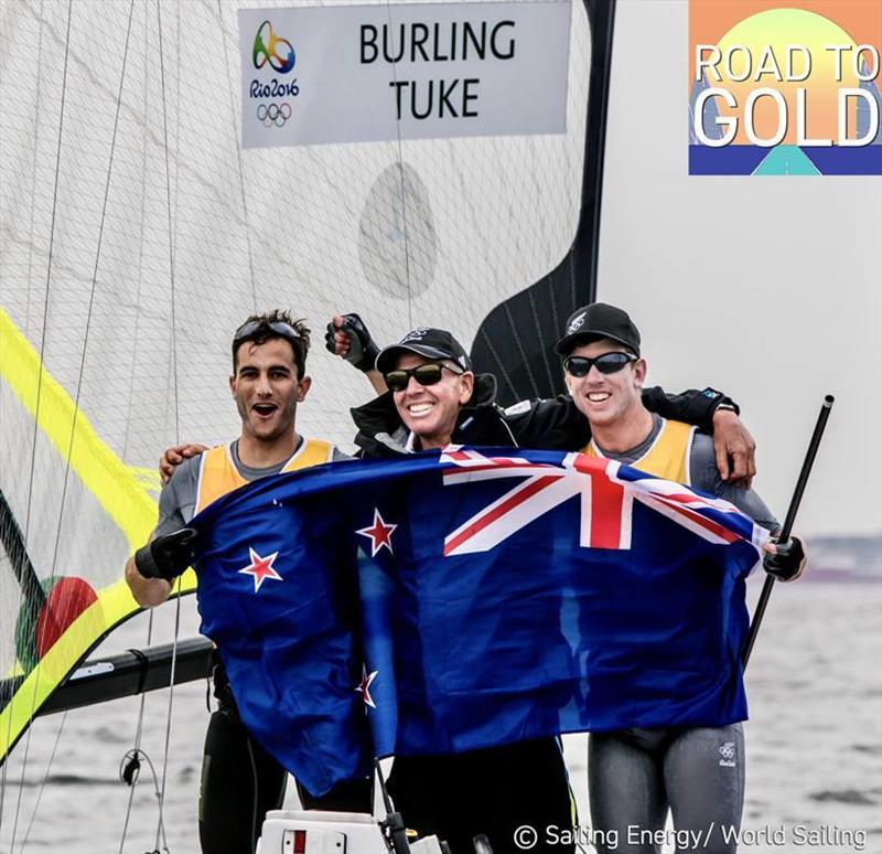 Hamish Willcox celebrates Olympic Gold with the world beating crew that he is still coaching today. Blair Tuke (left) and Pete Burling (right) photo copyright Sailing Energy / World Sailing taken at 