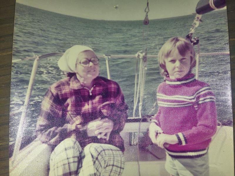 Mum and I sailing our family boat, age 6  - photo © Adrian Finglas