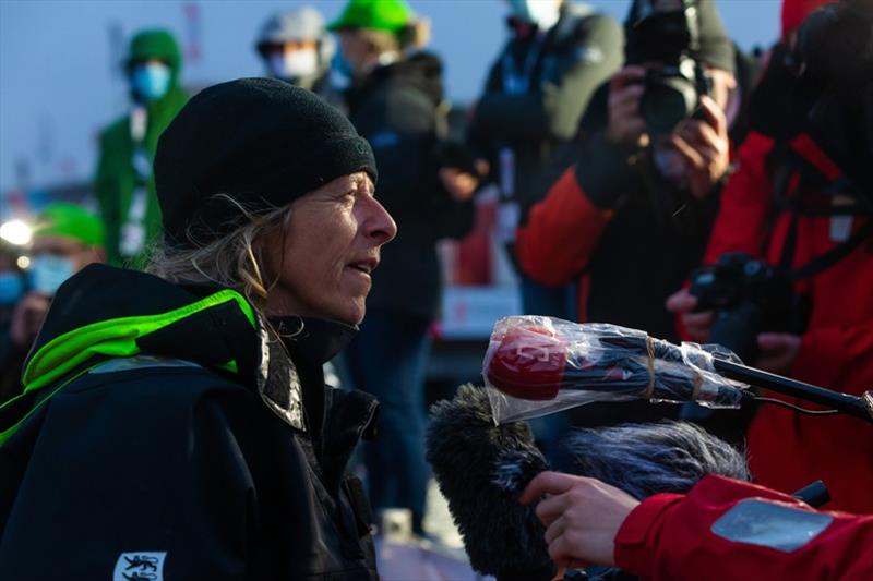 Skipper Miranda Merron, Campagne de France, is portraited being interviewed by media during arrival of the Vendee Globe sailing race photo copyright Jean-Marie Liot taken at 