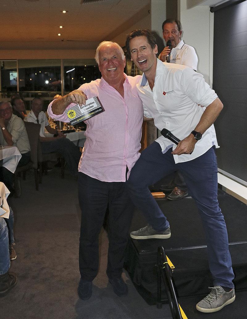 Flagstaff Marine's Michael Coxon (right) may have met his match for joviality in the wonderful Ivor Burgess (left), whilst Graham Raspass gets a rare moment to use the microphone photo copyright John Curnow taken at Royal Prince Alfred Yacht Club