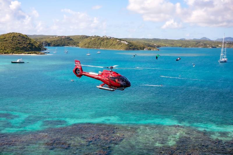 Calvinair Helicopter off the coast of Green Island photo copyright Antigua Sailing Week taken at Antigua Yacht Club