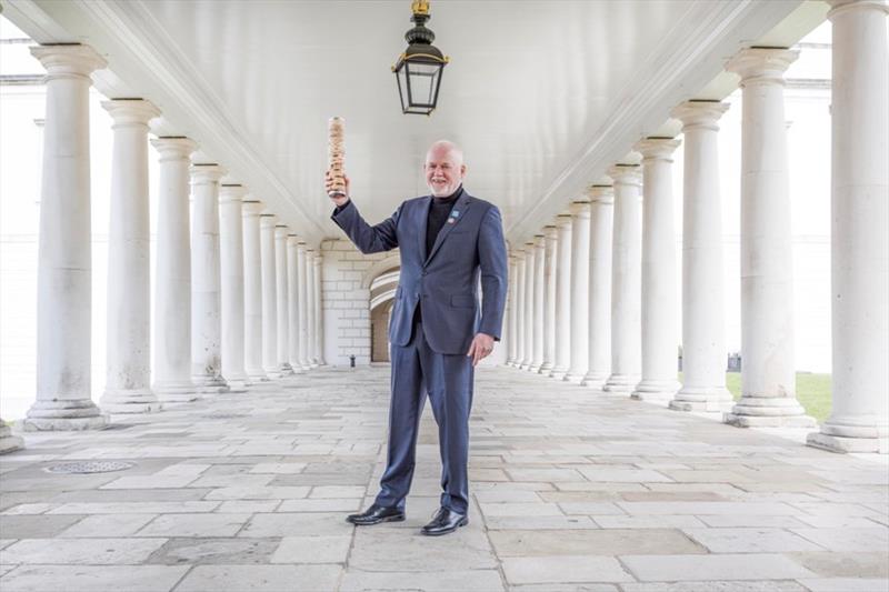 Ambassador Peter Thomson UN Secretary Generals Special Envoy for the Ocean holds aloft the Relay4Nature baton after receiving it at the National Maritime Museum in Greenwich London photo copyright Cherie Bridges / The Ocean Race taken at 