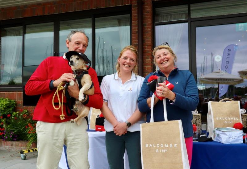 Jonty Sherwill and Vicki Weston with Toby, collecting their Salcombe Gin and Harken goodies from RSrnYC Sailing Secretary, Emily Robertson. - photo © Louay Habib