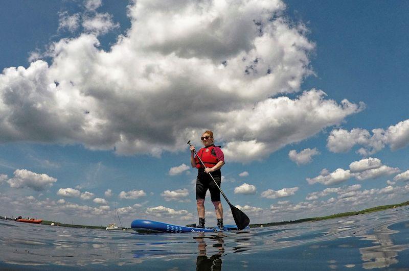 Members of the public are invited to try paddleboarding at Grafham Water SC's Sail for Cancer Day - photo © Paul Sanwell / OPP