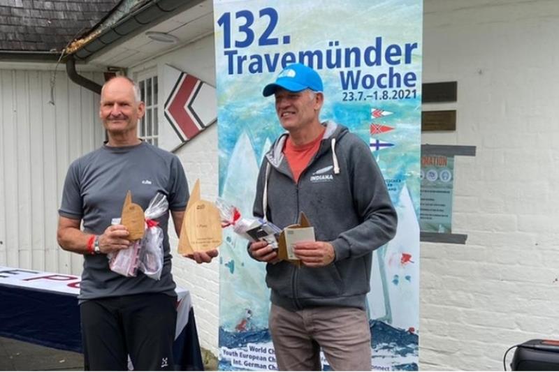 Prize giving ceremony with (L-R) Karsten Groth (2nd place) and Roger Oswald (3rd place) - Musto Skiff German Open at Travemünder Woche 2021 - photo © Travemünder Woche