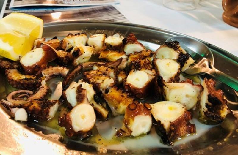 Grilled octopus at Gerekos Fish Tavern, Corfu photo copyright Offshore Sailing School taken at 